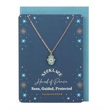 Load image into Gallery viewer, Hand of Hamsa Necklace on Greeting Card
