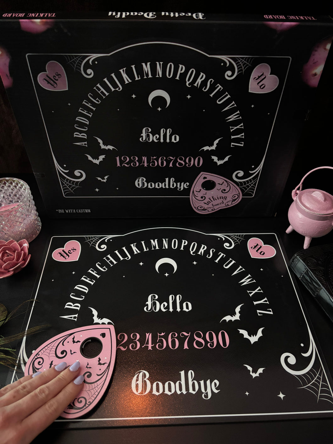 Pink and Black Talking Board