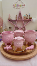 Load and play video in Gallery viewer, 11 cm Cast Iron Cauldron - Pink
