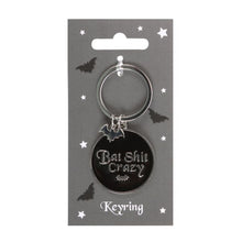 Load image into Gallery viewer, Round Bat Shit Crazy Keyring
